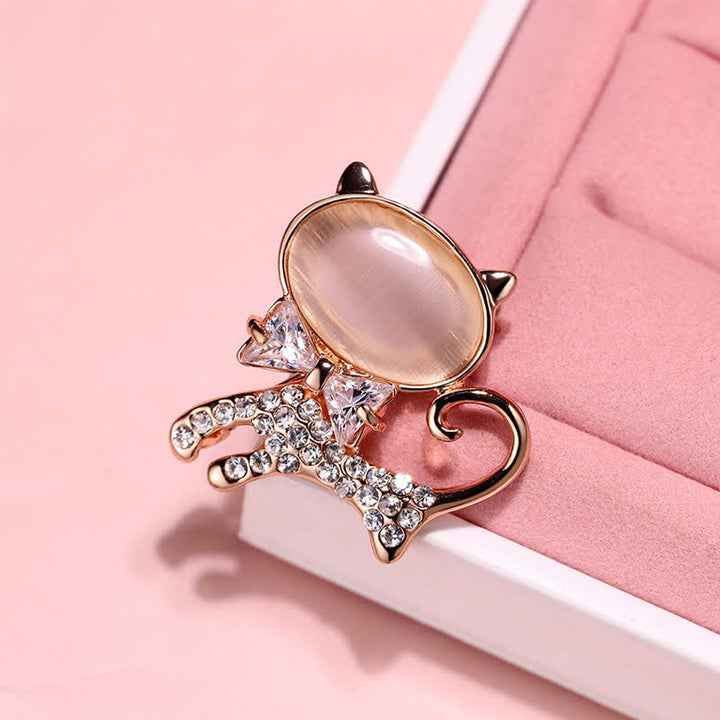 Broche de mujer con gatito de ópalo y pajarita