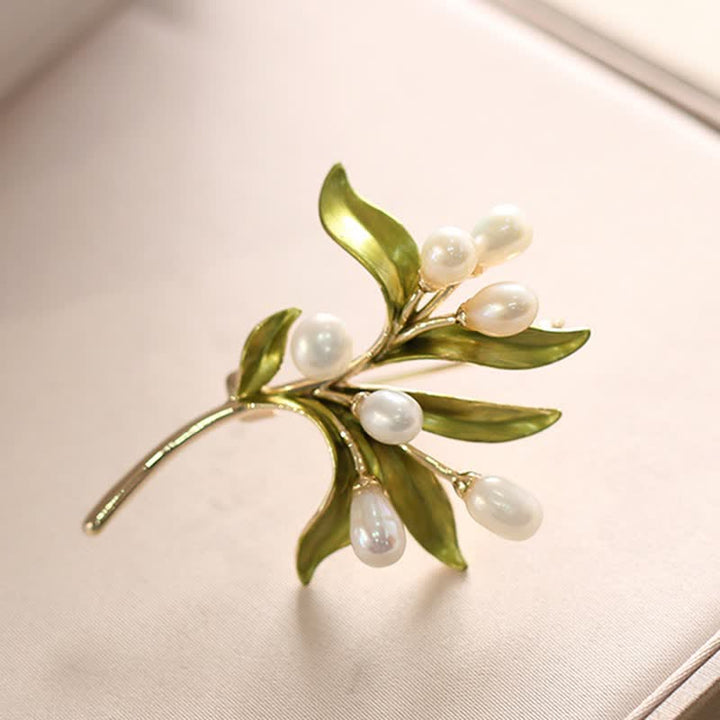 Broche de rama de olivo con perla natural para mujer
