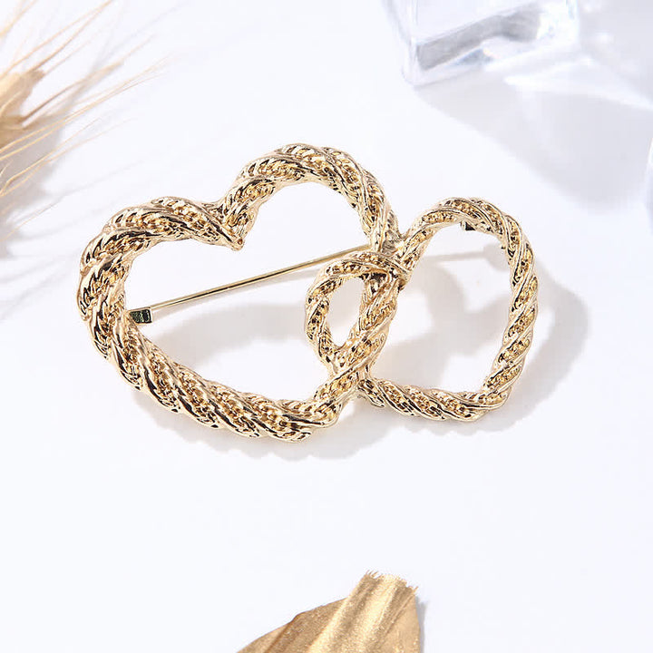 Broche de mujer de corazón a corazón con doble amor