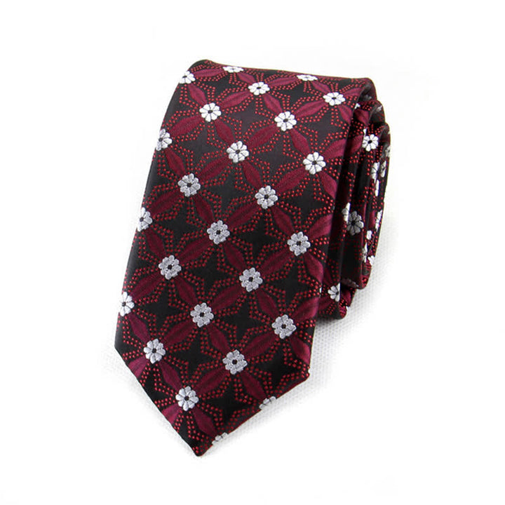 Corbata con diseño geométrico y flores bordadas para hombre.