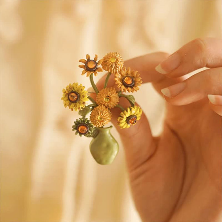 Broche de mujer con forma de girasol esmaltado